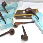 LOTE 279 - LOTE COM 6 RAROS CACHIMBOS SÉCULO XX. (JCI, CARTER) -  EM MADEIRA COM A PITEIRA EM BAQUELITE, À SABER: 4 (QUATRO) CACHIMBOS JCI (J. CARNEIRO & IRMÃOS),  EM EXCELENTE ESTADO DE CONSERVAÇÃO. (NO ESTADO)
