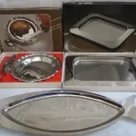 LOTE 212 - LOTE COM TRAVESSAS EM INOX, COM COLHER E PEGADOR, SEM USO (NO ESTADO)