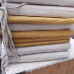 LOTE 432 - LOTE COM 11 ALMOFADAS PARA CADEIRAS DE TELINHAS (NO ESTADO)
