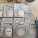 LOTE 639 - COLEÇÃO AVIÕES DE COMBATE COM.LIVROS E FITAS E COLEÇÃO COUSTEAU (NO ESTADO)
