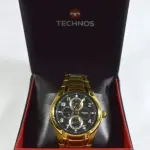 LOTE 682 - TECHNOS ORIGINAL  CRONÓGRAFO COM CALENDÁRIO EMBALAGEM ORIGINAL SEM USO, COM MAIS  2 PARCELAS PARA REGULAGEM. (NO ESTADO) 