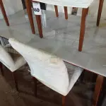 LOTE 460 - 01 MESA EM MADEIRA COM TAMPO OFF WHITE E 06 CADEIRAS ESTOFADAS. (NO ESTADO) ATENÇÃO! FAZER A VISITAÇÃO ANTES DE ARREMATAR, NÃO SABEMOS SE FUNCIONA. LEILÃO NÃO TEM GARANTIA E NEM DEVOLUÇÃO, SUJEITO A POSSÍVEIS AVARIAS VISÍVEIS/OCULTAS E/OU AUSÊNCIA DE COMPONENTES.