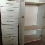 LOTE 221 - 01 ARMÁRIO ALTO EM MADEIRA COM 02 PORTAS E 02 PRATELEIRAS E 02 GAVETEIROS COM 04 GAVETAS.  (NO ESTADO) ATENÇÃO! FAZER A VISITAÇÃO ANTES DE ARREMATAR, NÃO SABEMOS SE FUNCIONA. LEILÃO NÃO TEM GARANTIA E NEM DEVOLUÇÃO, SUJEITO A POSSÍVEIS AVARIAS VISÍVEIS/OCULTAS E/OU AUSÊNCIA DE COMPONENTES.