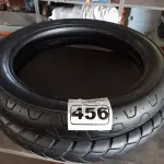 LOTE 456 - 02 PNEUS DE MOTO 100/90/18, 90/90/21. (NO ESTADO) ATENÇÃO! FAZER A VISITAÇÃO ANTES DE ARREMATAR, NÃO SABEMOS SE FUNCIONA. LEILÃO NÃO TEM GARANTIA E NEM DEVOLUÇÃO, SUJEITO A POSSÍVEIS AVARIAS VISÍVEIS/OCULTAS E/OU AUSÊNCIA DE COMPONENTES.