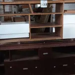 LOTE 533 - 02 RACK’S BAIXOS EM MADEIRA COM RODINHAS. (NO ESTADO) ATENÇÃO! FAZER A VISITAÇÃO ANTES DE ARREMATAR, NÃO SABEMOS SE FUNCIONA. LEILÃO NÃO TEM GARANTIA E NEM DEVOLUÇÃO, SUJEITO A POSSÍVEIS AVARIAS VISÍVEIS/OCULTAS E/OU AUSÊNCIA DE COMPONENTES.