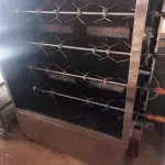 LOTE 117 - 01 ASSADEIRA DE FRANGO VENANCIO PARA 30 FRANGOS COM 06 ESPETOS EM AÇO INOX. (NO ESTADO, NÃO SABEMOS SE FUNCIONA.LEILÃO NÃO TEM GARANTIA E NEM DEVOLUÇÃO).