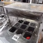LOTE 130 - 01 BALCÃO INDUSTRIAL REFRIGERADO COM 09 CUBAS E 02 PASSADORES EM AÇO INOX. (NO ESTADO. LEILÃO NÃO TEM GARANTIA E NEM DEVOLUÇÃO).