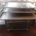 LOTE 191 - 01 CARRINHO INDUSTRIAL COM RODINHAS E 15 BANDEJAS MEDINDO 98CMX96CM EM AÇO INOX. (UTILIZADO PARA INDUSTRIAS DE PIZZA, SALGADOS E PASTEIS) (NO ESTADO, NÃO SABEMOS SE FUNCIONA. LEILÃO NÃO TEM GARANTIA E NEM DEVOLUÇÃO).
