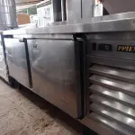 LOTE 141 - 01 BALCÃO REFRIGERADO MARCA PPIENK  EM AÇO INOX MEDINDO 180CMX71CM. (NO ESTADO. LEILÃO NÃO TEM GARANTIA E NEM DEVOLUÇÃO). 