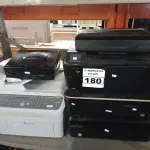 LOTE 180 - 04 IMPRESSORAS, 01 SUCATA DE VIDEOGAME E 01 MÁQUINA DE ESCREVER MARCAS E MODELOS DIVERSOS. (NO ESTADO) ATENÇÃO! FAZER A VISITAÇÃO ANTES DE ARREMATAR, NÃO SABEMOS SE FUNCIONA. LEILÃO NÃO TEM GARANTIA E NEM DEVOLUÇÃO, SUJEITO A POSSÍVEIS AVARIAS VISÍVEIS/OCULTAS E/OU AUSÊNCIA DE COMPONENTES.