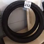 LOTE 412 - 02 PNEUS DE MOTO USADOS 90/90/21 E 80/90/21. (NO ESTADO) ATENÇÃO! FAZER A VISITAÇÃO ANTES DE ARREMATAR, NÃO SABEMOS SE FUNCIONA. LEILÃO NÃO TEM GARANTIA E NEM DEVOLUÇÃO, SUJEITO A POSSÍVEIS AVARIAS VISÍVEIS/OCULTAS E/OU AUSÊNCIA DE COMPONENTES.