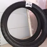 LOTE 412 - 02 PNEUS DE MOTO USADOS 90/90/21 E 80/90/21. (NO ESTADO) ATENÇÃO! FAZER A VISITAÇÃO ANTES DE ARREMATAR, NÃO SABEMOS SE FUNCIONA. LEILÃO NÃO TEM GARANTIA E NEM DEVOLUÇÃO, SUJEITO A POSSÍVEIS AVARIAS VISÍVEIS/OCULTAS E/OU AUSÊNCIA DE COMPONENTES.