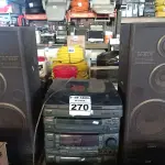 LOTE 270 - 01 APARELHO DE SOM 3X1 MARCA AIWA. (NO ESTADO) ATENÇÃO! FAZER A VISITAÇÃO ANTES DE ARREMATAR, NÃO SABEMOS SE FUNCIONA. LEILÃO NÃO TEM GARANTIA E NEM DEVOLUÇÃO, SUJEITO A POSSÍVEIS AVARIAS VISÍVEIS/OCULTAS E/OU AUSÊNCIA DE COMPONENTES.