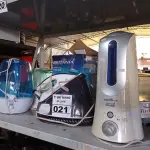 LOTE 021 - 05 UMIDIFICADORES S DE AR E 01 FERRO DE PASSAR A VAPOR MARCAS E MODELOS DIVERSOS. (NO ESTADO) ATENÇÃO! FAZER A VISITAÇÃO ANTES DE ARREMATAR, NÃO SABEMOS SE FUNCIONA. LEILÃO NÃO TEM GARANTIA E NEM DEVOLUÇÃO, SUJEITO A POSSÍVEIS AVARIAS VISÍVEIS/OCULTAS E/OU AUSÊNCIA DE COMPONENTES.