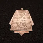 LOTE 009 - LOTE 9 – MEDALHAS PALESTRA ITÁLIA - ESPORTE 	MEDALHA	OBSERVAÇÕES 1.		Joquei Clube do Paraná – Festa da Terra. 1931	Acobreada - envelope da Coleção Júlio Estrella Moreira 2.		Joquei Clube do Paraná – Festa da Terra. 1931	Acobreada 3.		Joquei Clube do Paraná – Festa da Terra. 1931	Acobreada 4.		Joquei Clube do Paraná – Festa da Terra. 1931	Acobreada 5.		Joquei Clube do Paraná – Festa da Terra. 1931	Acobreada 6.		Joquei Clube do Paraná – Festa da Terra. 1931	Acobreada 7.		Graciosa Country Club – Campeonato de Tênis 1939. Gravador Mueller	Prateada - envelope da Coleção Júlio Estrella Moreira 8.		Graciosa Country Club – 1938. Gravador Mueller	Prateada - envelope da Coleção Júlio Estrella Moreira 9.		Graciosa Country Club – 1938. Gravador  J. Peón	Bronze - envelope da Coleção Júlio Estrella Moreira 10.		Graciosa Country Club – 1938. Gravador J. Peón	Bronze 11.		Sociedade de Tiro ao Alvo de Curitiba. 1940 Gravador: Mueller	Prateada - envelope da Coleção Júlio Estrella Moreira
