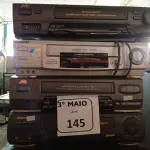 LOTE 145 - 06 VÍDEOS CASSETES MARCAS E MODELOS DIVERSOS. (NO ESTADO) ATENÇÃO! FAZER A VISITAÇÃO ANTES DE ARREMATAR, NÃO SABEMOS SE FUNCIONA. LEILÃO NÃO TEM GARANTIA E NEM DEVOLUÇÃO, SUJEITO A POSSÍVEIS AVARIAS VISÍVEIS/OCULTAS E/OU AUSÊNCIA DE COMPONENTES.