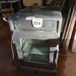 LOTE 374 - 01 ESTUFA ELÉTRICA EM INOX COM 02 BANDEJAS, MODELO:HHC983 DE 240V. (NO ESTADO) ATENÇÃO! FAZER A VISITAÇÃO ANTES DE ARREMATAR, NÃO SABEMOS SE FUNCIONA. LEILÃO NÃO TEM GARANTIA E NEM DEVOLUÇÃO, SUJEITO A POSSÍVEIS AVARIAS VISÍVEIS/OCULTAS E/OU AUSÊNCIA DE COMPONENTES.