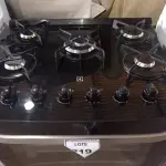 LOTE 219 - 01 FOGÃO ELECTROLUX 5 BOCAS BIVOLTS (RANGE). (NO ESTADO EM QUE SE ENCONTRA. SUJEITO A AVARIAS OCULTAS/VISÍVEIS.) BF8678C
