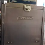 LOTE 001 - 01 LAVA-LOUÇAS INDUSTRIAL EM INOX INCOMPLETA, MODELO AMT2 MARCA HOBAT. (NO ESTADO) ATENÇÃO! FAZER A VISITAÇÃO ANTES DE ARREMATAR, NÃO SABEMOS SE FUNCIONA. LEILÃO NÃO TEM GARANTIA E NEM DEVOLUÇÃO, SUJEITO A POSSÍVEIS AVARIAS VISÍVEIS/OCULTAS E/OU AUSÊNCIA DE COMPONENTES.