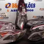 LOTE 009 - 08 – FARÓIS DIVERSOS (NO ESTADO, NÃO SABEMOS SE FUNCIONA. LEILÃO NÃO TEM GARANTIA E NEM DEVOLUÇÃO, SUJEITO A POSSÍVEIS AVARIAS VISÍVEIS/OCULTAS E/OU AUSÊNCIA DE COMPONENTES)