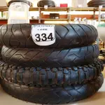 LOTE 334 - 04 PNEUS DE MOTO USADOS COM NUMERAÇÕES DIVERSAS. (NO ESTADO) ATENÇÃO! FAZER A VISITAÇÃO ANTES DE ARREMATAR, NÃO SABEMOS SE FUNCIONA. LEILÃO NÃO TEM GARANTIA E NEM DEVOLUÇÃO, SUJEITO A POSSÍVEIS AVARIAS VISÍVEIS/OCULTAS E/OU AUSÊNCIA DE COMPONENTES.