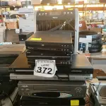 LOTE 372 - 01 CLIMATIZADOR MARCA PHILCO 220V, 02 VIDEOCASSETES E DIVERSOS APARELHOS DE DVDS MARCAS E MODELOS DIVERSOS. (NO ESTADO) ATENÇÃO! FAZER A VISITAÇÃO ANTES DE ARREMATAR, NÃO SABEMOS SE FUNCIONA. LEILÃO NÃO TEM GARANTIA E NEM DEVOLUÇÃO, SUJEITO A POSSÍVEIS AVARIAS VISÍVEIS/OCULTAS E/OU AUSÊNCIA DE COMPONENTES.