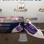 LOTE 267 - 01 FERRO DE PASSAR ROUPAS A VAPOR ELECTROLUX COR BRANCA C/ ROXO (NOVO). (NO ESTADO) ATENÇÃO! FAZER A VISITAÇÃO ANTES DE ARREMATAR, NÃO SABEMOS SE FUNCIONA. LEILÃO NÃO TEM GARANTIA E NEM DEVOLUÇÃO, SUJEITO A POSSÍVEIS AVARIAS VISÍVEIS/OCULTAS E/OU AUSÊNCIA DE COMPONENTES.