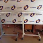 LOTE 229 - 02 MESAS COM RODINHAS E REGULADOR DE ALTURA. (NO ESTADO) ATENÇÃO! FAZER A VISITAÇÃO ANTES DE ARREMATAR, NÃO SABEMOS SE FUNCIONA. LEILÃO NÃO TEM GARANTIA E NEM DEVOLUÇÃO, SUJEITO A POSSÍVEIS AVARIAS VISÍVEIS/OCULTAS E/OU AUSÊNCIA DE COMPONENTES.