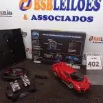 LOTE 402 - 01 CARRINHO DE CONTROLE REMOTO. (NO ESTADO) ATENÇÃO! FAZER A VISITAÇÃO ANTES DE ARREMATAR, NÃO SABEMOS SE FUNCIONA. LEILÃO NÃO TEM GARANTIA E NEM DEVOLUÇÃO, SUJEITO A POSSÍVEIS AVARIAS VISÍVEIS/OCULTAS E/OU AUSÊNCIA DE COMPONENTES.