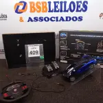 LOTE 409 - 01 CARRINHO DE CONTROLE REMOTO. (NO ESTADO) ATENÇÃO! FAZER A VISITAÇÃO ANTES DE ARREMATAR, NÃO SABEMOS SE FUNCIONA. LEILÃO NÃO TEM GARANTIA E NEM DEVOLUÇÃO, SUJEITO A POSSÍVEIS AVARIAS VISÍVEIS/OCULTAS E/OU AUSÊNCIA DE COMPONENTES.