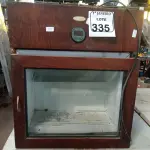 LOTE 335 - 01 ADEGA CLIMATIZADA C/ACABAMENTO EM MADEIRA. (NO ESTADO) ATENÇÃO! FAZER A VISITAÇÃO ANTES DE ARREMATAR, NÃO SABEMOS SE FUNCIONA. LEILÃO NÃO TEM GARANTIA E NEM DEVOLUÇÃO, SUJEITO A POSSÍVEIS AVARIAS VISÍVEIS/OCULTAS E/OU AUSÊNCIA DE COMPONENTES.