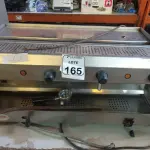 LOTE 165 - 01 MÁQUINA DE CAFÉ EXPRESSO EM INOX INDUSTRIAL. (NO ESTADO) ATENÇÃO! FAZER A VISITAÇÃO ANTES DE ARREMATAR, NÃO SABEMOS SE FUNCIONA. LEILÃO NÃO TEM GARANTIA E NEM DEVOLUÇÃO, SUJEITO A POSSÍVEIS AVARIAS VISÍVEIS/OCULTAS E/OU AUSÊNCIA DE COMPONENTES.