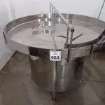 LOTE 003 - 01 MESA ALIMENTADORA DE GARRAFAS ROTATIVA 1,4M DIÂMETRO MILA INOX. (NO ESTADO) ATENÇÃO! FAZER A VISITAÇÃO ANTES DE ARREMATAR, NÃO SABEMOS SE FUNCIONA. LEILÃO NÃO TEM GARANTIA E NEM DEVOLUÇÃO, SUJEITO A POSSÍVEIS AVARIAS VISÍVEIS/OCULTAS E/OU AUSÊNCIA DE COMPONENTES.