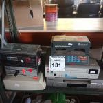 LOTE 131 - 02 VÍDEOS CASSETES, 02 IMPRESSORAS DE CHEQUE, 01 PURIFICADOR DE ÁGUA E 01 SCANNER. (NO ESTADO) ATENÇÃO! FAZER A VISITAÇÃO ANTES DE ARREMATAR, NÃO SABEMOS SE FUNCIONA. LEILÃO NÃO TEM GARANTIA E NEM DEVOLUÇÃO, SUJEITO A POSSÍVEIS AVARIAS VISÍVEIS/OCULTAS E/OU AUSÊNCIA DE COMPONENTES.