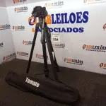 LOTE 354 - 01 TRIPÉ PARA CÂMERA TOMATE MTG-3016. (NO ESTADO) ATENÇÃO! FAZER A VISITAÇÃO ANTES DE ARREMATAR, NÃO SABEMOS SE FUNCIONA. LEILÃO NÃO TEM GARANTIA E NEM DEVOLUÇÃO, SUJEITO A POSSÍVEIS AVARIAS VISÍVEIS/OCULTAS E/OU AUSÊNCIA DE COMPONENTES.