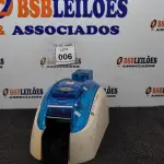 LOTE 006 - 01 IMPRESSORA DE CARTÃO. DUALUYS EVOLIS. (NO ESTADO) ATENÇÃO! FAZER A VISITAÇÃO ANTES DE ARREMATAR, NÃO SABEMOS SE FUNCIONA. LEILÃO NÃO TEM GARANTIA E NEM DEVOLUÇÃO, SUJEITO A POSSÍVEIS AVARIAS VISÍVEIS/OCULTAS E/OU AUSÊNCIA DE COMPONENTES.