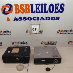 LOTE 011 - 02 PROJETORES MARCA DLP. (NO ESTADO) ATENÇÃO! FAZER A VISITAÇÃO ANTES DE ARREMATAR, NÃO SABEMOS SE FUNCIONA, LEILÃO NÃO TEM GARANTIA E NEM DEVOLUÇÃO, SUJEITO A POSSÍVEIS AVARIAS VISÍVEIS/OCULTAS E/OU AUSÊNCIA DE COMPONENTES.