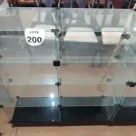 LOTE 200 - 01 VITRINE EXPOSITORA DE VIDRO. (NO ESTADO) ATENÇÃO! FAZER A VISITAÇÃO ANTES DE ARREMATAR, NÃO SABEMOS SE FUNCIONA, LEILÃO NÃO TEM GARANTIA E NEM DEVOLUÇÃO, SUJEITO A POSSÍVEIS AVARIAS VISÍVEIS/OCULTAS E/OU AUSÊNCIA DE COMPONENTES.