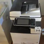 LOTE 315 - 01 COPIADORA MODELO MPC303 MARCA RICOH. (NO ESTADO) ATENÇÃO! FAZER A VISITAÇÃO ANTES DE ARREMATAR, NÃO SABEMOS SE FUNCIONA, LEILÃO NÃO TEM GARANTIA E NEM DEVOLUÇÃO, SUJEITO A POSSÍVEIS AVARIAS VISÍVEIS/OCULTAS E/OU AUSÊNCIA DE COMPONENTES.