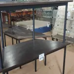 LOTE 575 - 02 MESAS COM TAMPO DE MADEIRA EM FORMA TRAPÉZIO.  (NO ESTADO) ATENÇÃO! FAZER A VISITAÇÃO ANTES DE ARREMATAR, NÃO SABEMOS SE FUNCIONA, LEILÃO NÃO TEM GARANTIA E NEM DEVOLUÇÃO, SUJEITO A POSSÍVEIS AVARIAS VISÍVEIS/OCULTAS E/OU AUSÊNCIA DE COMPONENTES.