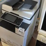 LOTE 315 - 01 COPIADORA MODELO MPC303 MARCA RICOH. (NO ESTADO) ATENÇÃO! FAZER A VISITAÇÃO ANTES DE ARREMATAR, NÃO SABEMOS SE FUNCIONA, LEILÃO NÃO TEM GARANTIA E NEM DEVOLUÇÃO, SUJEITO A POSSÍVEIS AVARIAS VISÍVEIS/OCULTAS E/OU AUSÊNCIA DE COMPONENTES.