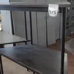 LOTE 575 - 02 MESAS COM TAMPO DE MADEIRA EM FORMA TRAPÉZIO.  (NO ESTADO) ATENÇÃO! FAZER A VISITAÇÃO ANTES DE ARREMATAR, NÃO SABEMOS SE FUNCIONA, LEILÃO NÃO TEM GARANTIA E NEM DEVOLUÇÃO, SUJEITO A POSSÍVEIS AVARIAS VISÍVEIS/OCULTAS E/OU AUSÊNCIA DE COMPONENTES.