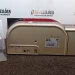 LOTE 184 - 01 IMPRESSORA DE CRACHÁ. (NO ESTADO) ATENÇÃO! FAZER A VISITAÇÃO ANTES DE ARREMATAR, NÃO SABEMOS SE FUNCIONA, LEILÃO NÃO TEM GARANTIA E NEM DEVOLUÇÃO, SUJEITO A POSSÍVEIS AVARIAS VISÍVEIS/OCULTAS E/OU AUSÊNCIA DE COMPONENTES.