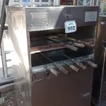 LOTE 502 - 01 CHURRASQUEIRA DUPLA EM INOX COM ESPETOS. (NO ESTADO) ATENÇÃO! FAZER A VISITAÇÃO ANTES DE ARREMATAR, NÃO SABEMOS SE FUNCIONA, LEILÃO NÃO TEM GARANTIA E NEM DEVOLUÇÃO, SUJEITO A POSSÍVEIS AVARIAS VISÍVEIS/OCULTAS E/OU AUSÊNCIA DE COMPONENTES.