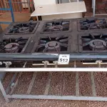 LOTE 512 - 01 FOGÃO INDUSTRIAL 6 BOCAS. (NO ESTADO) ATENÇÃO! FAZER A VISITAÇÃO ANTES DE ARREMATAR, NÃO SABEMOS SE FUNCIONA, LEILÃO NÃO TEM GARANTIA E NEM DEVOLUÇÃO, SUJEITO A POSSÍVEIS AVARIAS VISÍVEIS/OCULTAS E/OU AUSÊNCIA DE COMPONENTES.