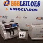 LOTE 141 - 02 MAQUINAS DE CONTAR CÉDULAS. (NO ESTADO) ATENÇÃO! FAZER A VISITAÇÃO ANTES DE ARREMATAR, NÃO SABEMOS SE FUNCIONA. LEILÃO NÃO TEM GARANTIA E NEM DEVOLUÇÃO, SUJEITO A POSSÍVEIS AVARIAS VISÍVEIS/OCULTAS E/OU AUSÊNCIA DE COMPONENTES.