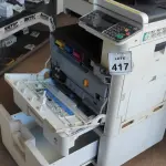 LOTE 417 - 01 IMPRESSORA MULTIFUNCIONAL MARCA KYOCERA. (NO ESTADO) ATENÇÃO! FAZER A VISITAÇÃO ANTES DE ARREMATAR, NÃO SABEMOS SE FUNCIONA, LEILÃO NÃO TEM GARANTIA E NEM DEVOLUÇÃO, SUJEITO A POSSÍVEIS AVARIAS VISÍVEIS/OCULTAS E/OU AUSÊNCIA DE COMPONENTES.
