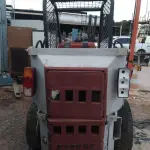 LOTE 526 - 01 BOBCAT M611 DIESEL COM PÁ BATERIA NOVA( NO ESTADO)