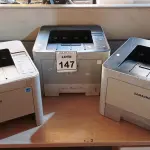 LOTE 147 - 03 IMPRESSORAS MARCA SAMSUNG. (NO ESTADO) ATENÇÃO! FAZER A VISITAÇÃO ANTES DE ARREMATAR, NÃO SABEMOS SE FUNCIONA, LEILÃO NÃO TEM GARANTIA E NEM DEVOLUÇÃO, SUJEITO A POSSÍVEIS AVARIAS VISÍVEIS/OCULTAS E/OU AUSÊNCIA DE COMPONENTES.