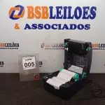 LOTE 005 - 01 IMPRESSORA DE ETIQUETAS MARCA TSC. (NO ESTADO) ATENÇÃO! FAZER A VISITAÇÃO ANTES DE ARREMATAR, NÃO SABEMOS SE FUNCIONA, LEILÃO NÃO TEM GARANTIA E NEM DEVOLUÇÃO, SUJEITO A POSSÍVEIS AVARIAS VISÍVEIS/OCULTAS E/OU AUSÊNCIA DE COMPONENTES.